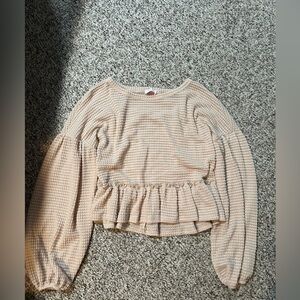 New trendy peplum style top.